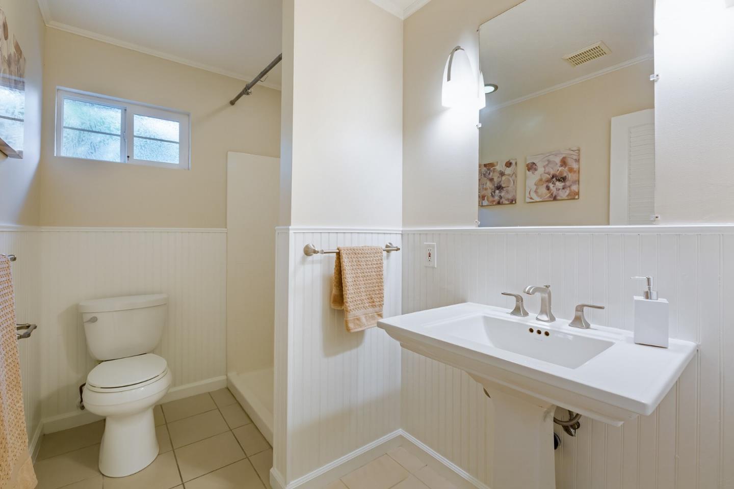 645 Chapman Drive Campbell, CA 95008 - Photo 25 of 33 a bathroom with a sink mirror and toilet