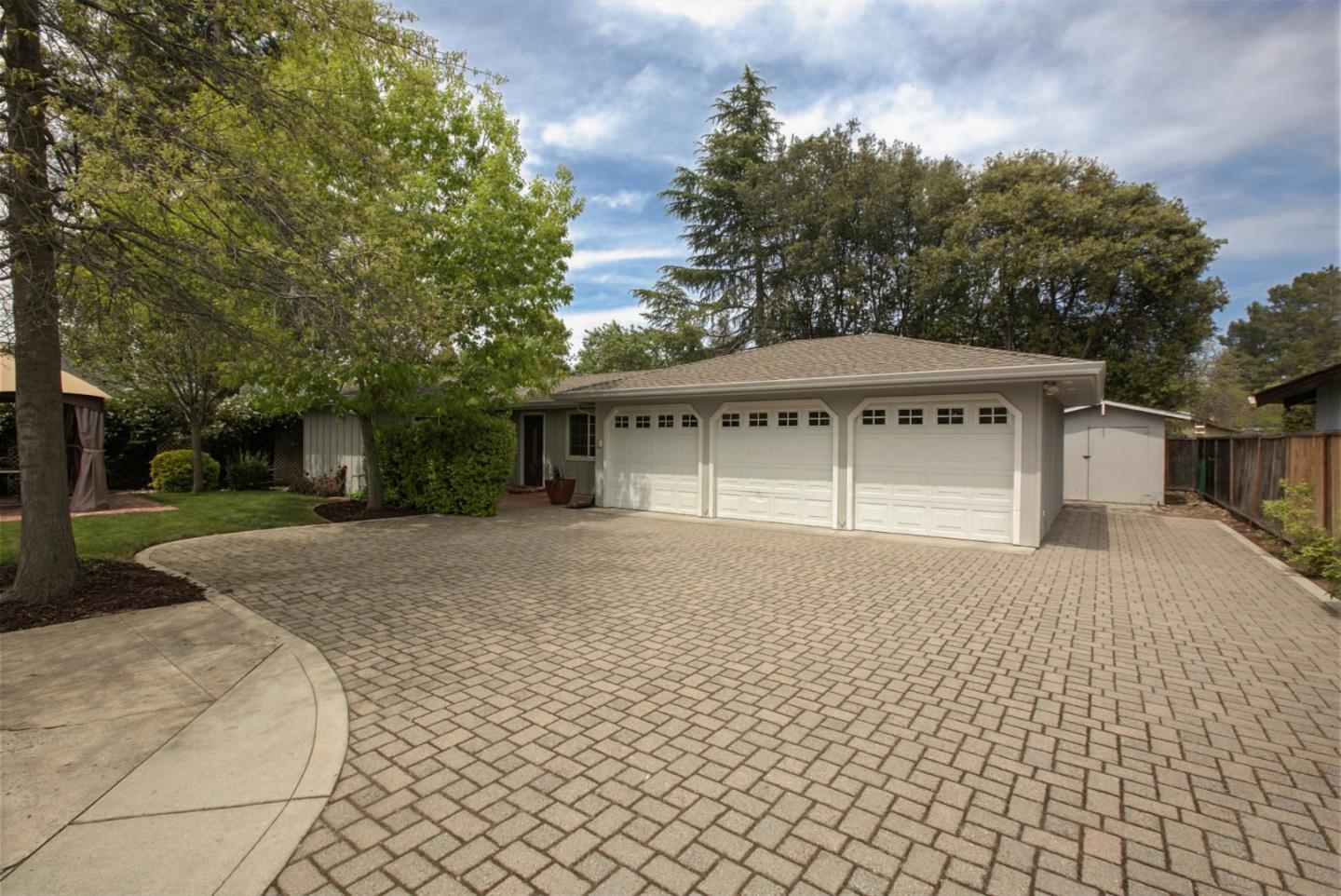 645 Chapman Drive Campbell, CA 95008 - Photo 28 of 33 a front view of a house with a yard and trees