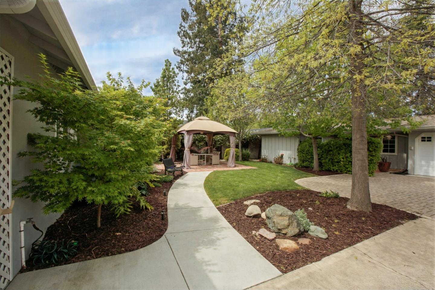 645 Chapman Drive Campbell, CA 95008 - Photo 29 of 33 a front view of a house with garden