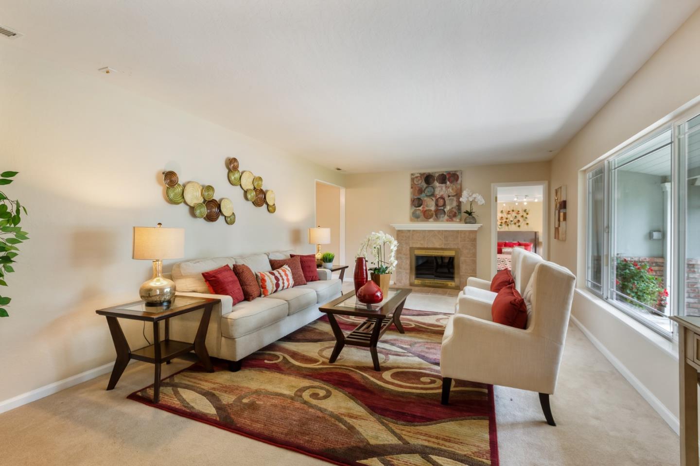 645 Chapman Drive Campbell, CA 95008 - Photo 3 of 33 a living room with furniture a fireplace and a large mirror