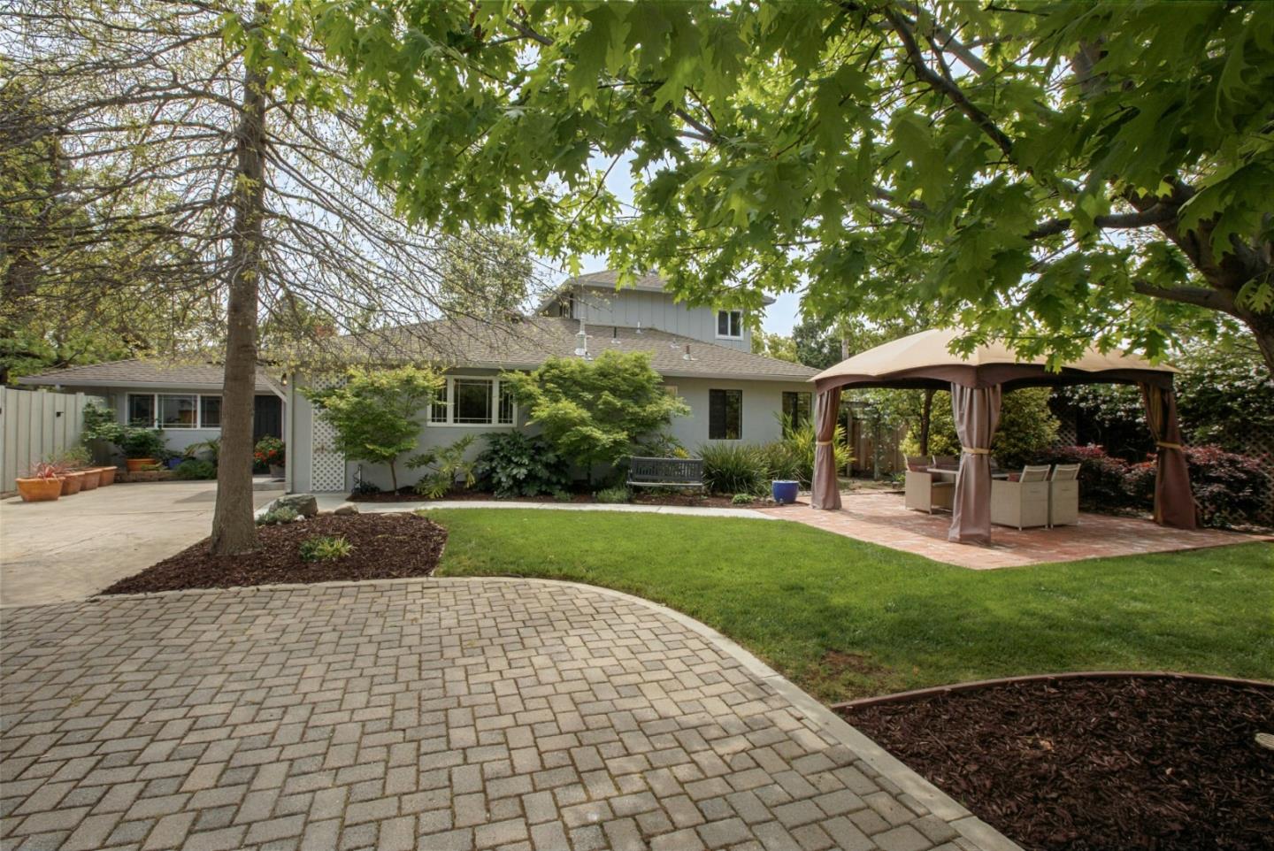 645 Chapman Drive Campbell, CA 95008 - Photo 31 of 33 a front view of a house with swimming pool and garden