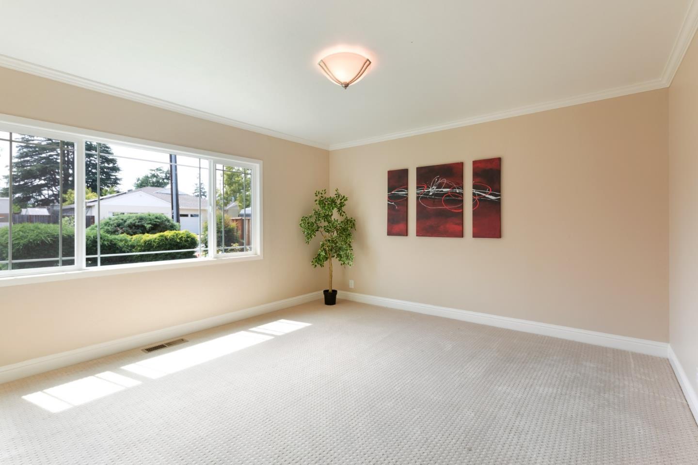 645 Chapman Drive Campbell, CA 95008 - Photo 10 of 33 an empty room with windows and entrance