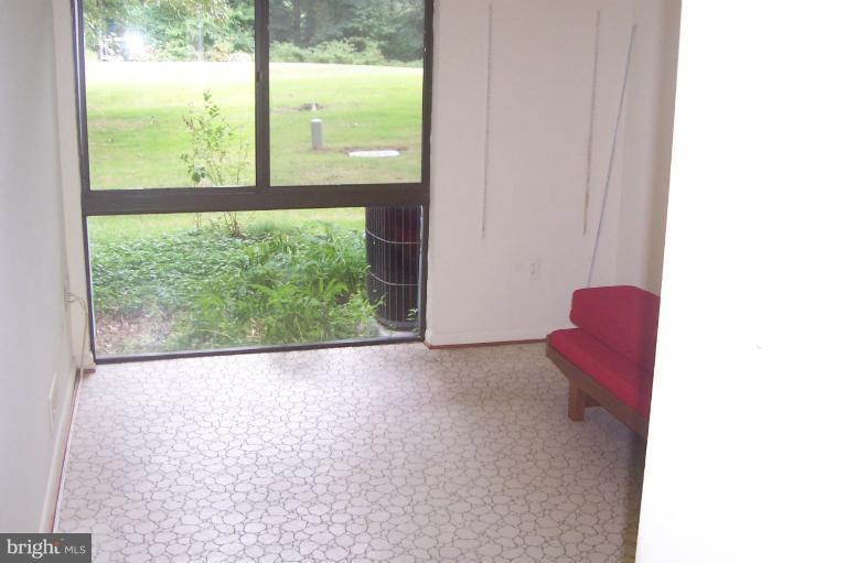 11614 Newbridge Court Reston, VA 20191 - Photo 3 of 16 a view of a room with a large window and sitting area