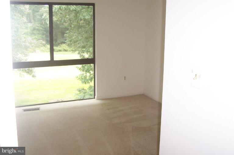 11614 Newbridge Court Reston, VA 20191 - Photo 7 of 16 a view of a room with a large window