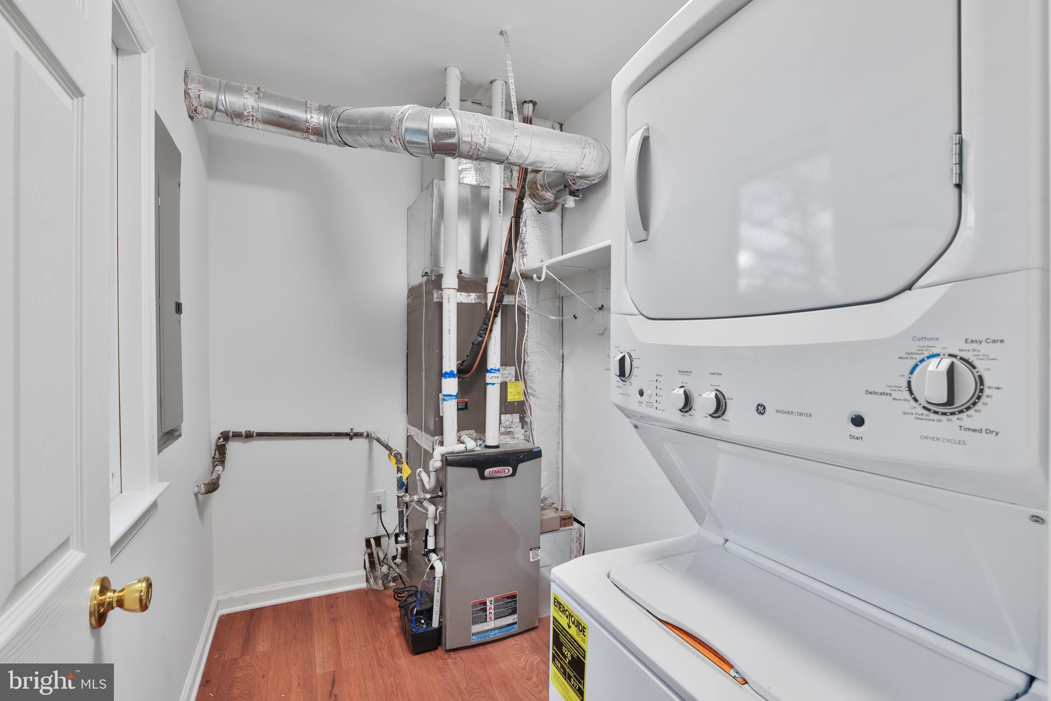 36 Thrush Road Sterling, VA 20164 - Photo 15 of 35 a utility room with dryer and washer