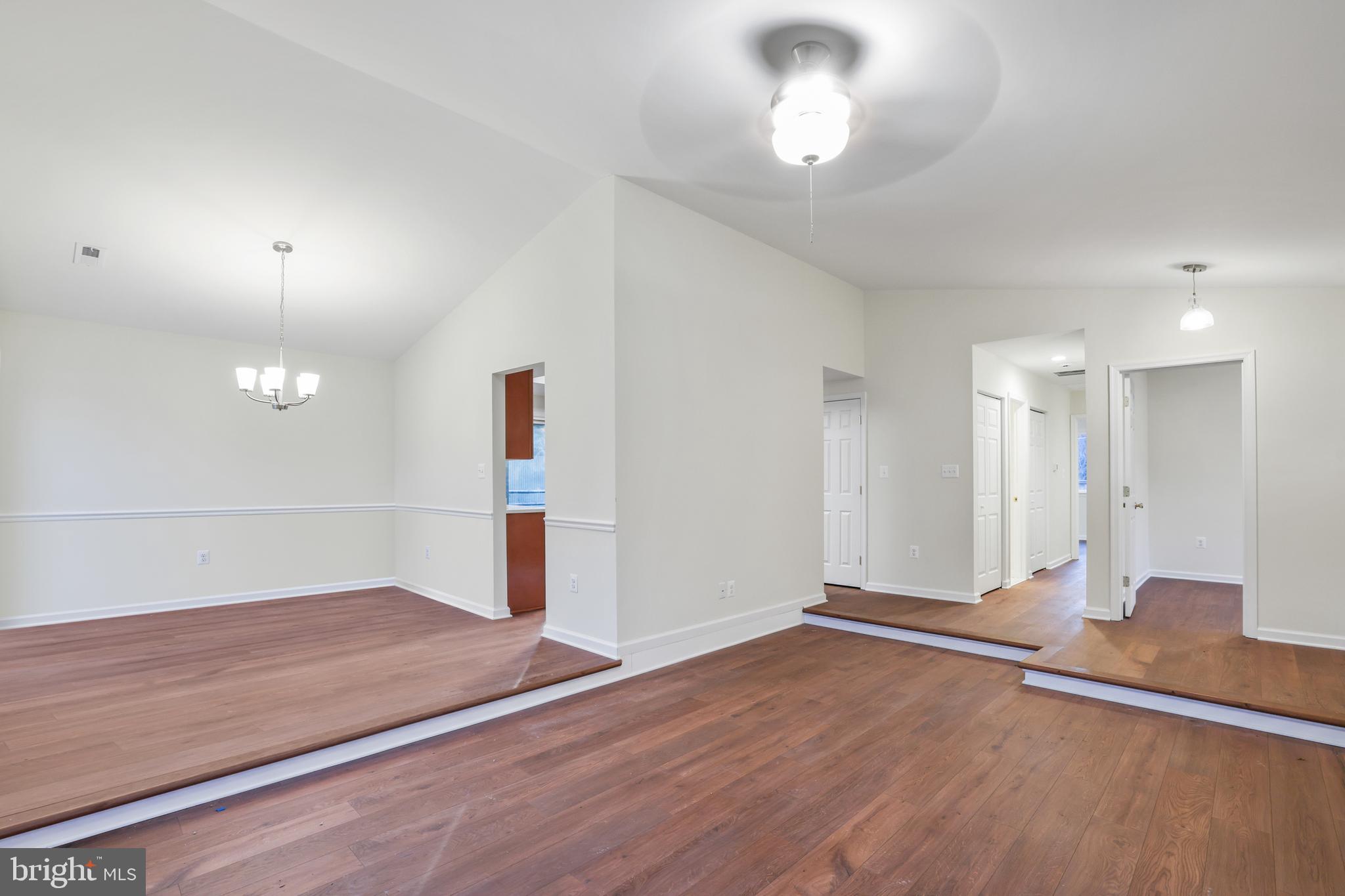36 Thrush Road Sterling, VA 20164 - Photo 22 of 35 wooden floor in an empty room with a window