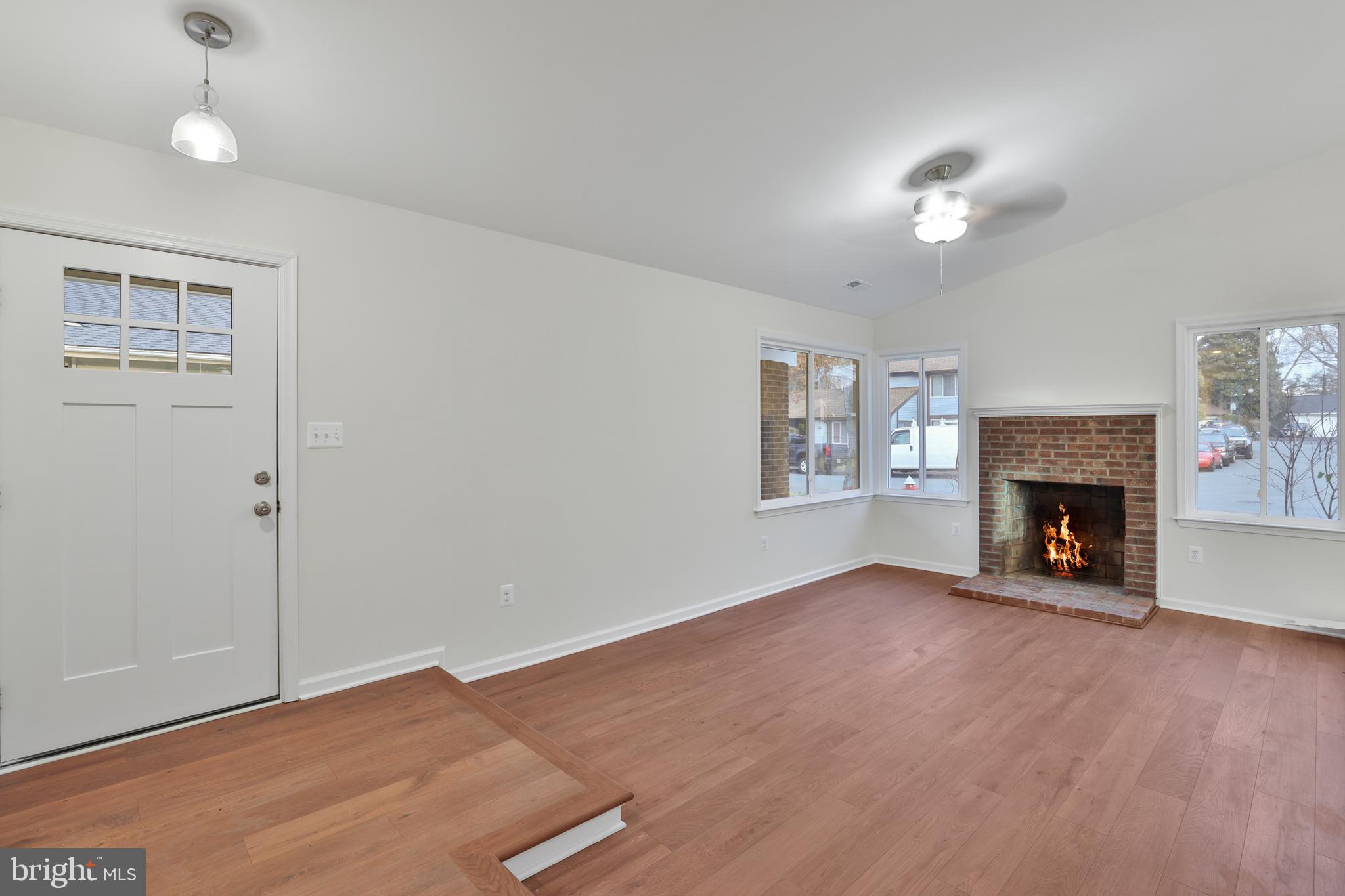 36 Thrush Road Sterling, VA 20164 - Photo 23 of 35 an empty room with windows and fireplace