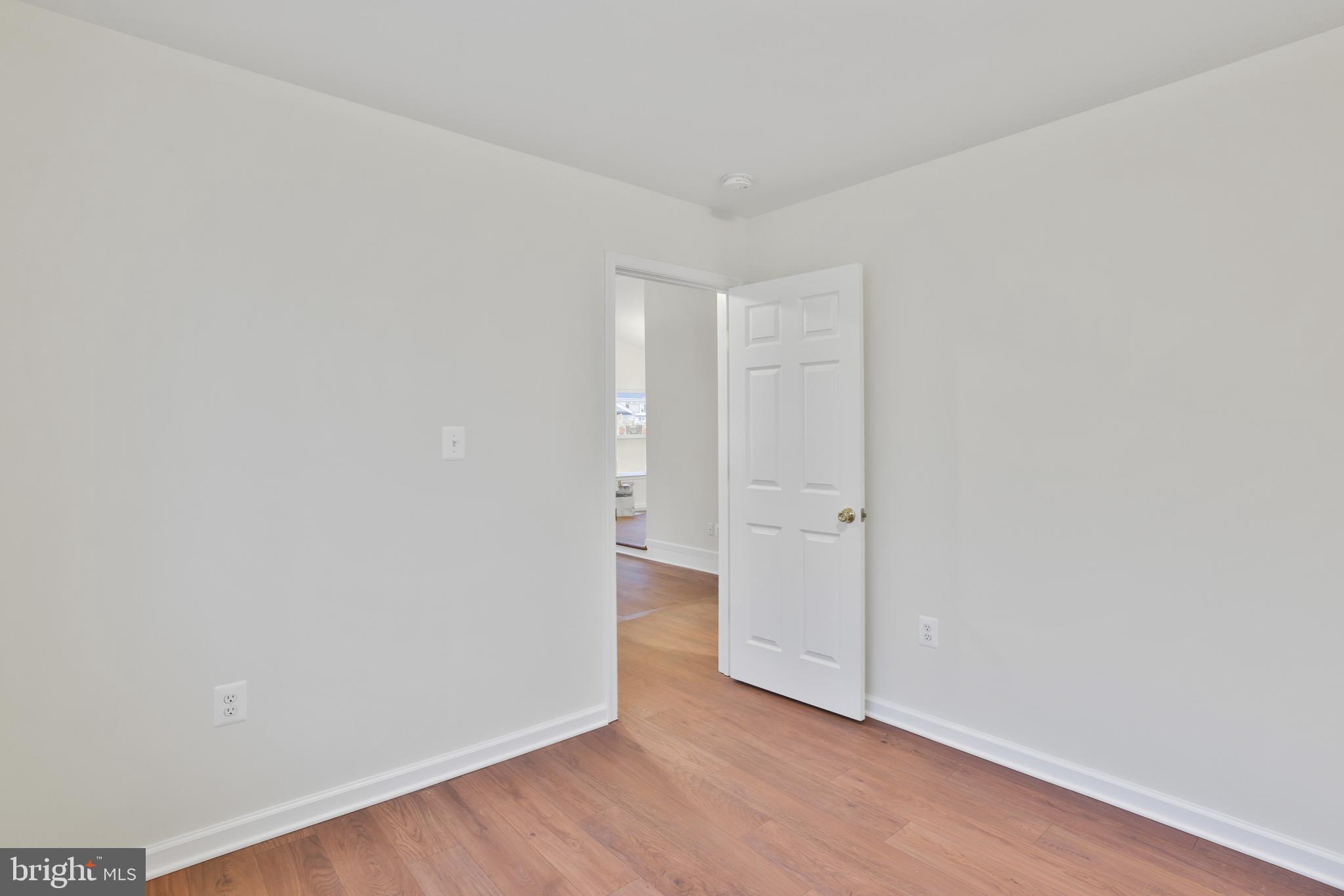 36 Thrush Road Sterling, VA 20164 - Photo 26 of 35 a view of an empty room with wooden floor