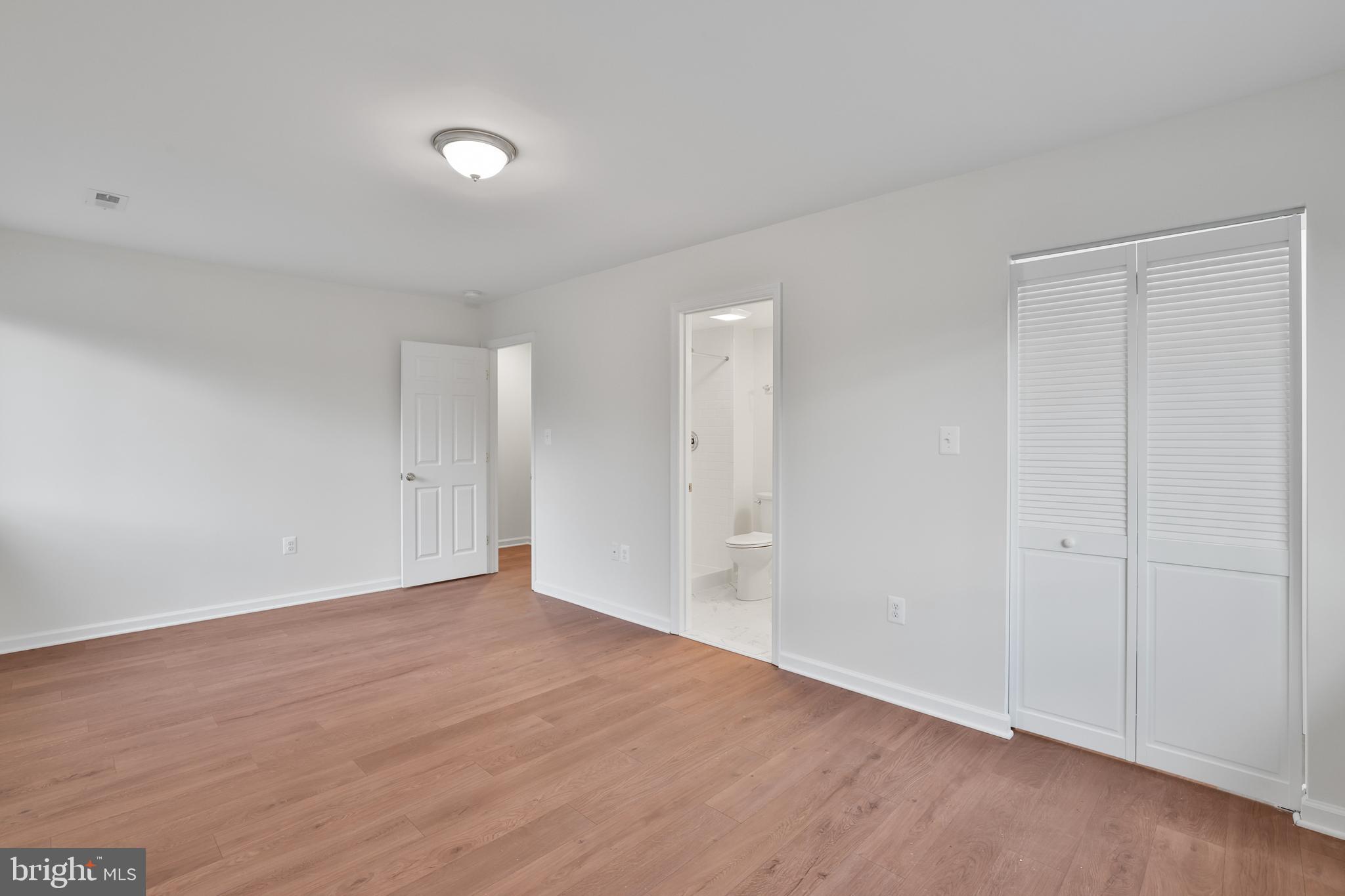 36 Thrush Road Sterling, VA 20164 - Photo 28 of 35 a view of an empty room with wooden floor