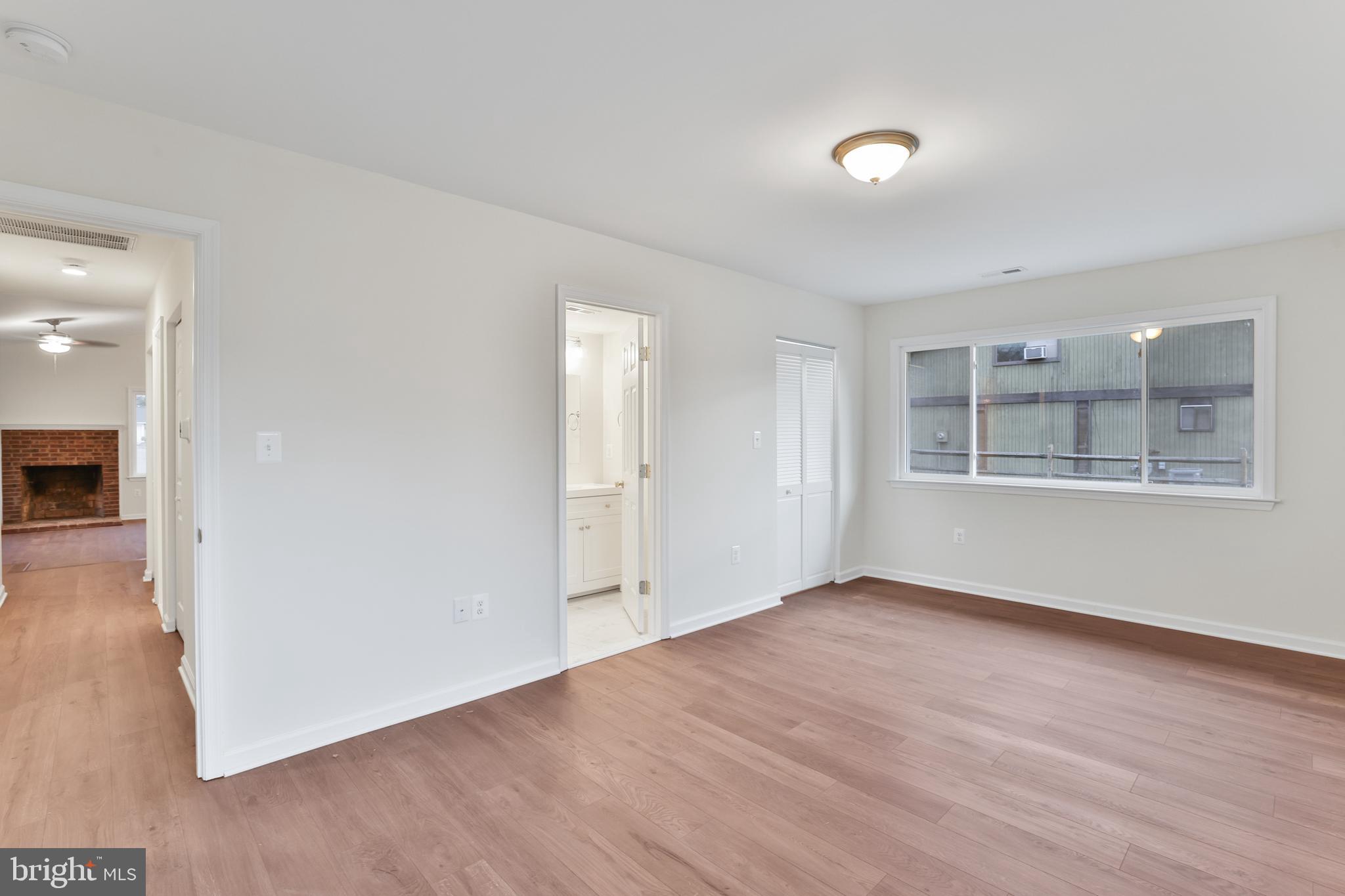 36 Thrush Road Sterling, VA 20164 - Photo 29 of 35 wooden floor in an empty room with a window