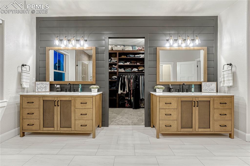 18762 Cherry Springs Ranch Drive Monument, CO 80132 - Photo 13 of 50 a kitchen with a refrigerator and a stove