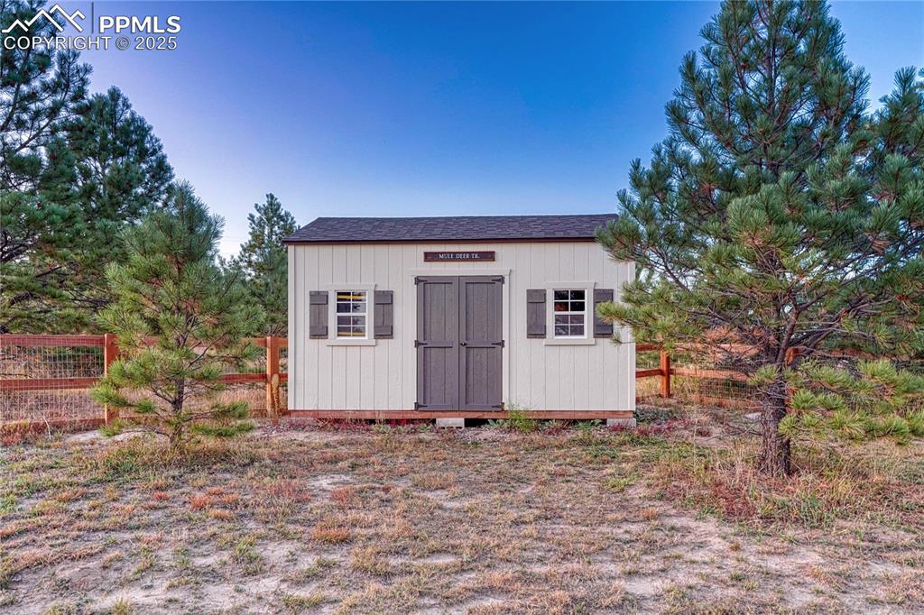 18762 Cherry Springs Ranch Drive Monument, CO 80132 - Photo 41 of 50 a view of a house with a yard and tree