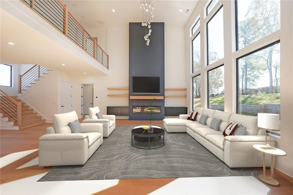 156 Rocky Ridge Way Auburn, GA 30011 - Photo 16 of 56 a living room with furniture and a flat screen tv