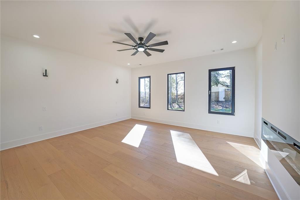 156 Rocky Ridge Way Auburn, GA 30011 - Photo 31 of 56 a view of an empty room with windows