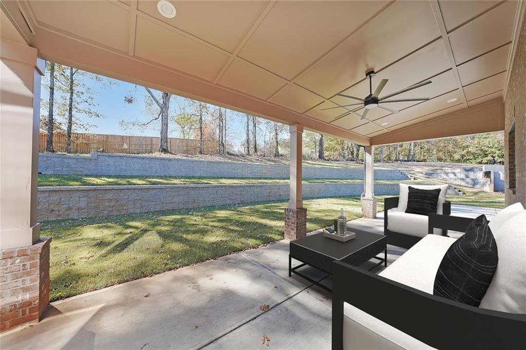 156 Rocky Ridge Way Auburn, GA 30011 - Photo 52 of 56 a living room with large windows