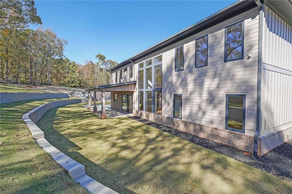 156 Rocky Ridge Way Auburn, GA 30011 - Photo 55 of 56 a view of a house with a tub