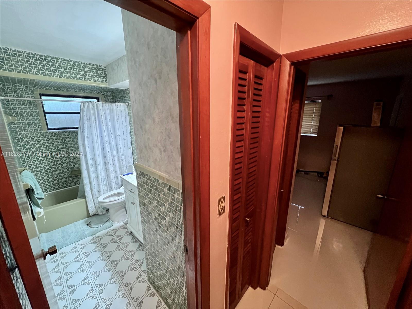 9601 Southwest 66th Street Miami, FL 33173 - Photo 20 of 52 front view of a house with a porch