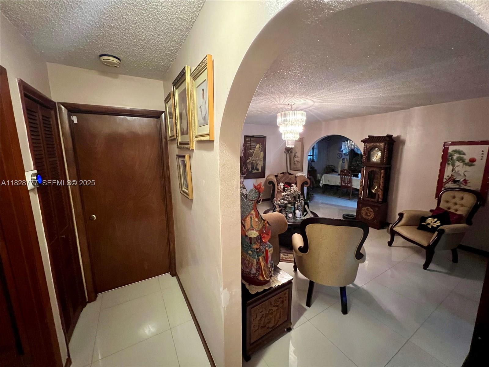9601 Southwest 66th Street Miami, FL 33173 - Photo 24 of 52 a view of a livingroom with furniture and a couch