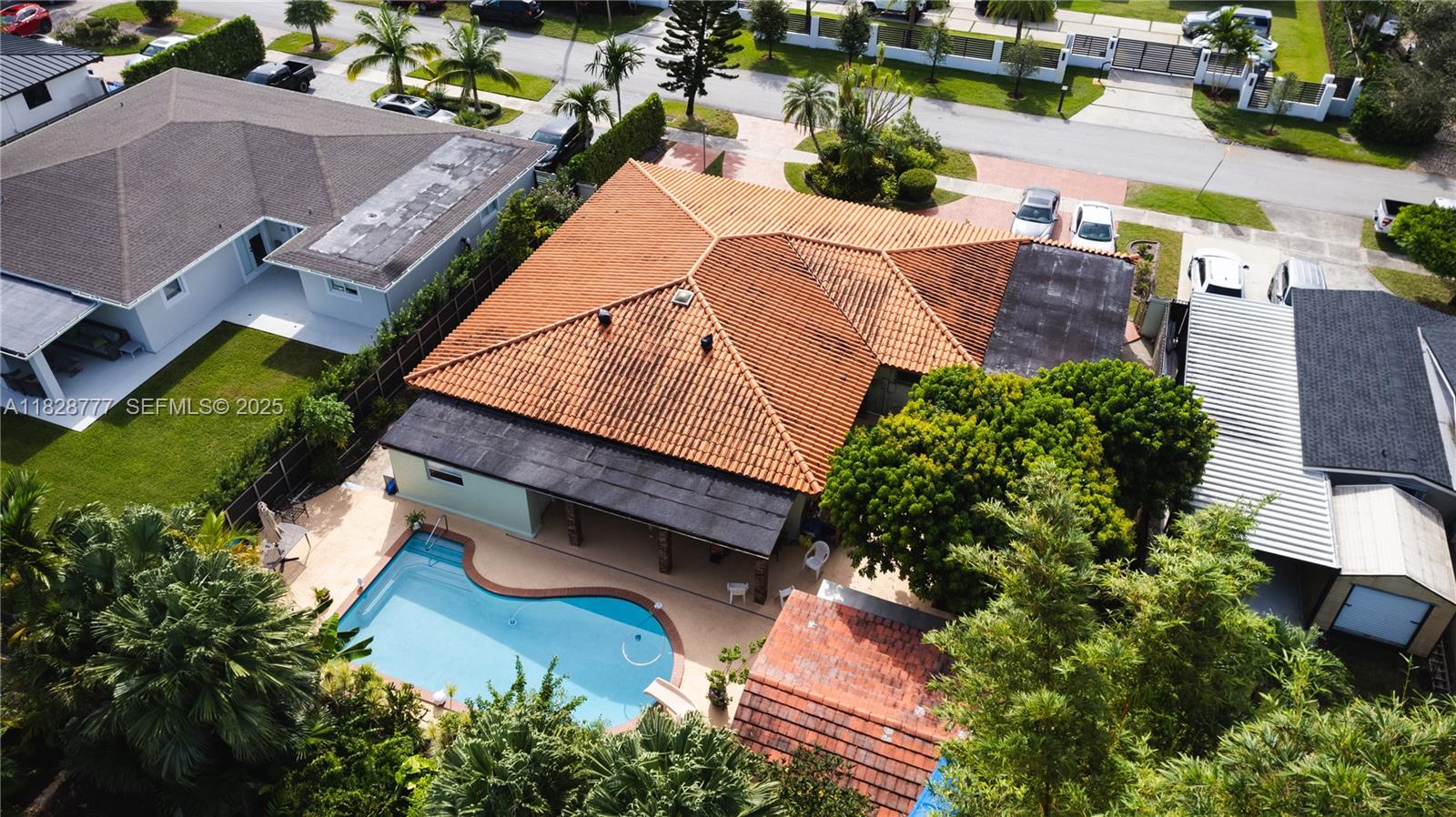 9601 Southwest 66th Street Miami, FL 33173 - Photo 52 of 52 an aerial view of a house with a yard