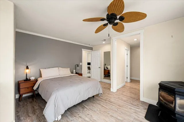 a view of a house with a yard patio and a slide