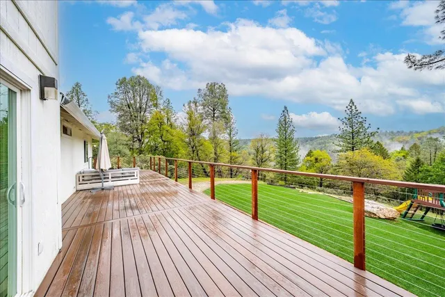 a large kitchen with a table and chairs in it