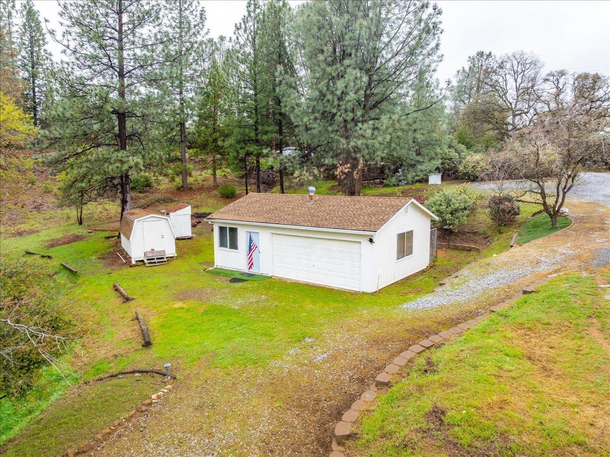 2227 Swansboro Road Placerville, CA 95667 - Photo 43 of 59 a view of a house with pool and a yard