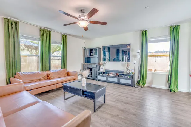 a kitchen with stainless steel appliances a sink stove and refrigerator