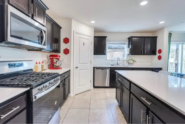 a bathroom with a sink double vanity and a mirror