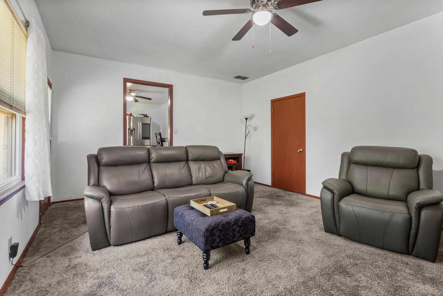2305 East Shurts Circle Urbana, IL 61801 - Photo 11 of 26 a living room with furniture and a rug