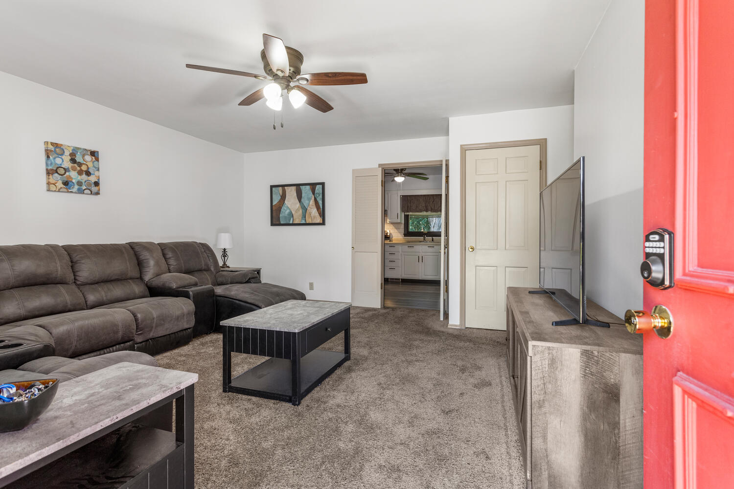 2305 East Shurts Circle Urbana, IL 61801 - Photo 3 of 26 a living room with furniture and a chandelier