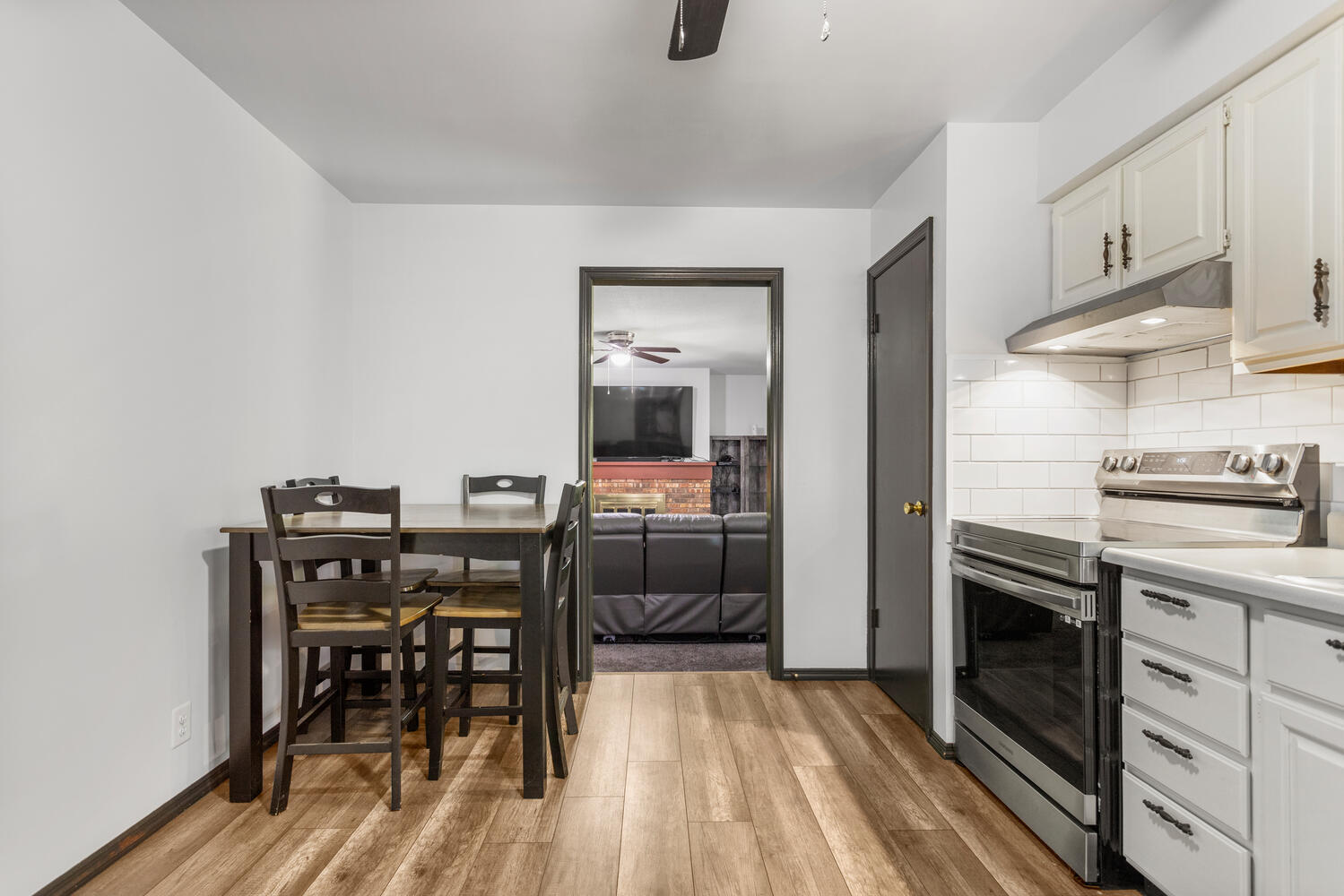 2305 East Shurts Circle Urbana, IL 61801 - Photo 8 of 26 a kitchen with a table and chairs in it