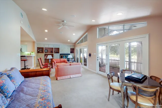 a living room with furniture and a table