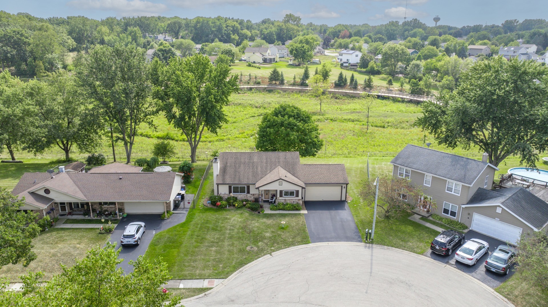 1151 Sandpebble Circle Algonquin, IL 60102 - Photo 3 of 34 an aerial view of a house with garden space and street view
