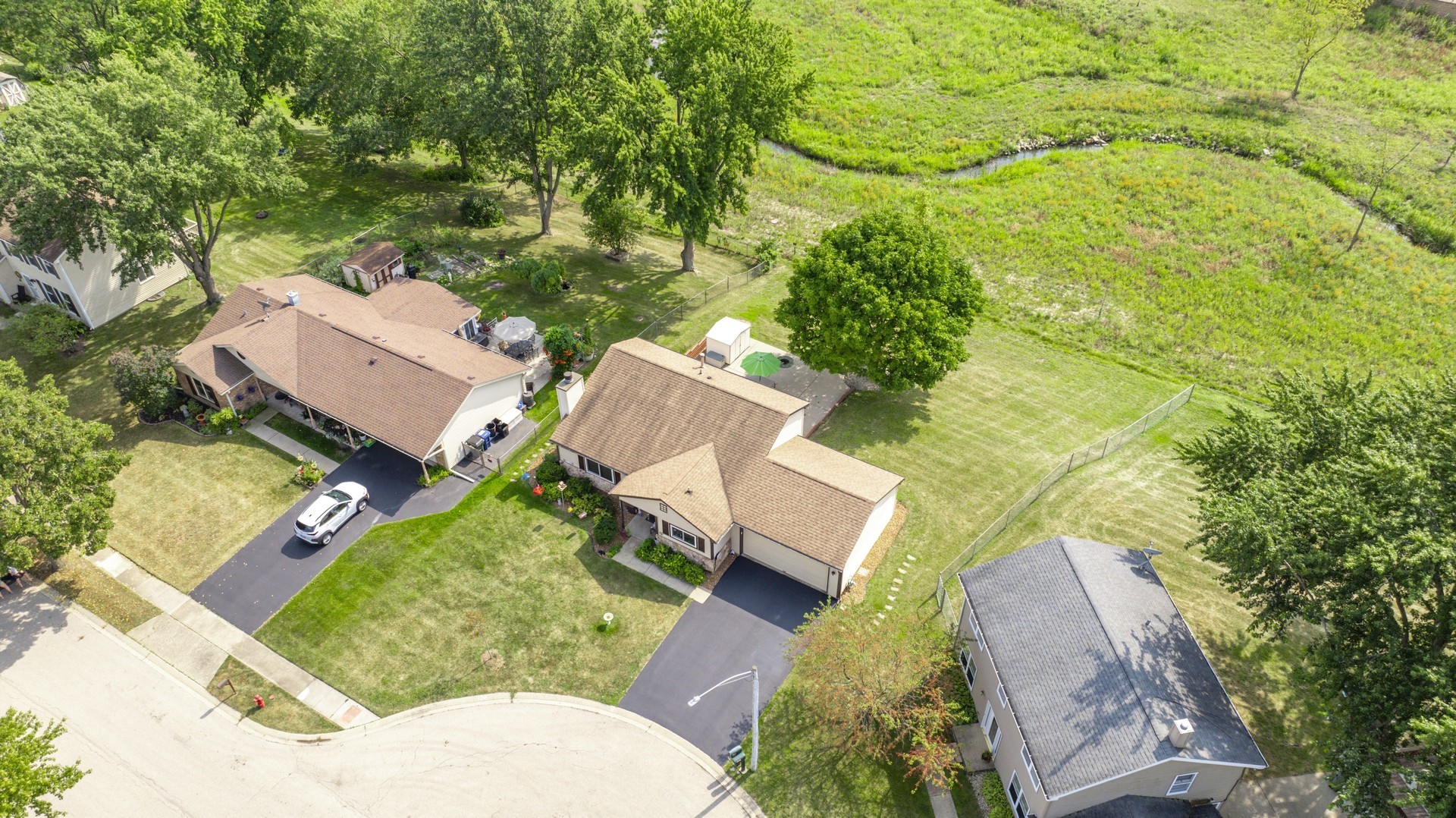 1151 Sandpebble Circle Algonquin, IL 60102 - Photo 4 of 34 an aerial view of a house with garden space and street view