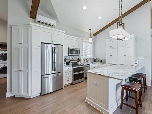 a bathroom with a sink a vanity and a mirror