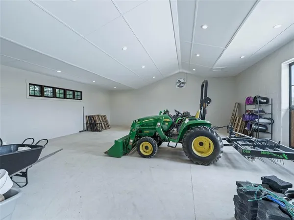 an aerial view of a house with big yard