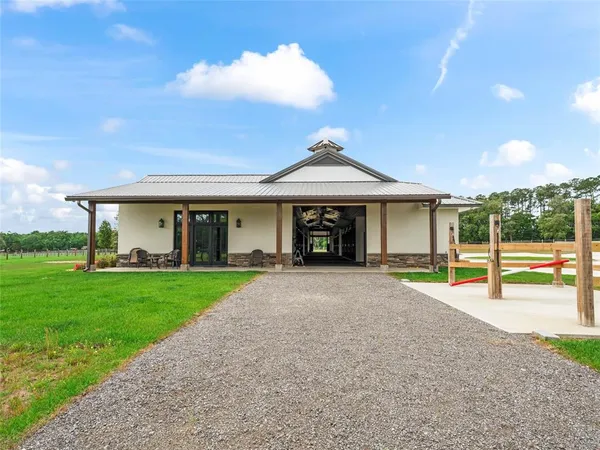 a aerial view of a golf course with a big yard