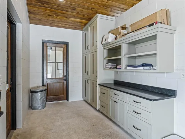 a view of entryway with a front door