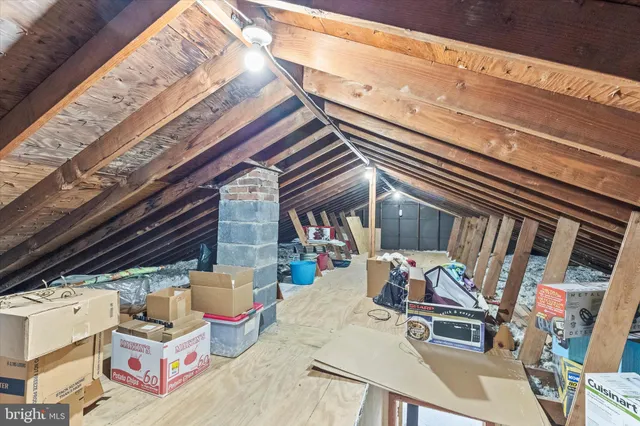 a view of a building with a snow on the road