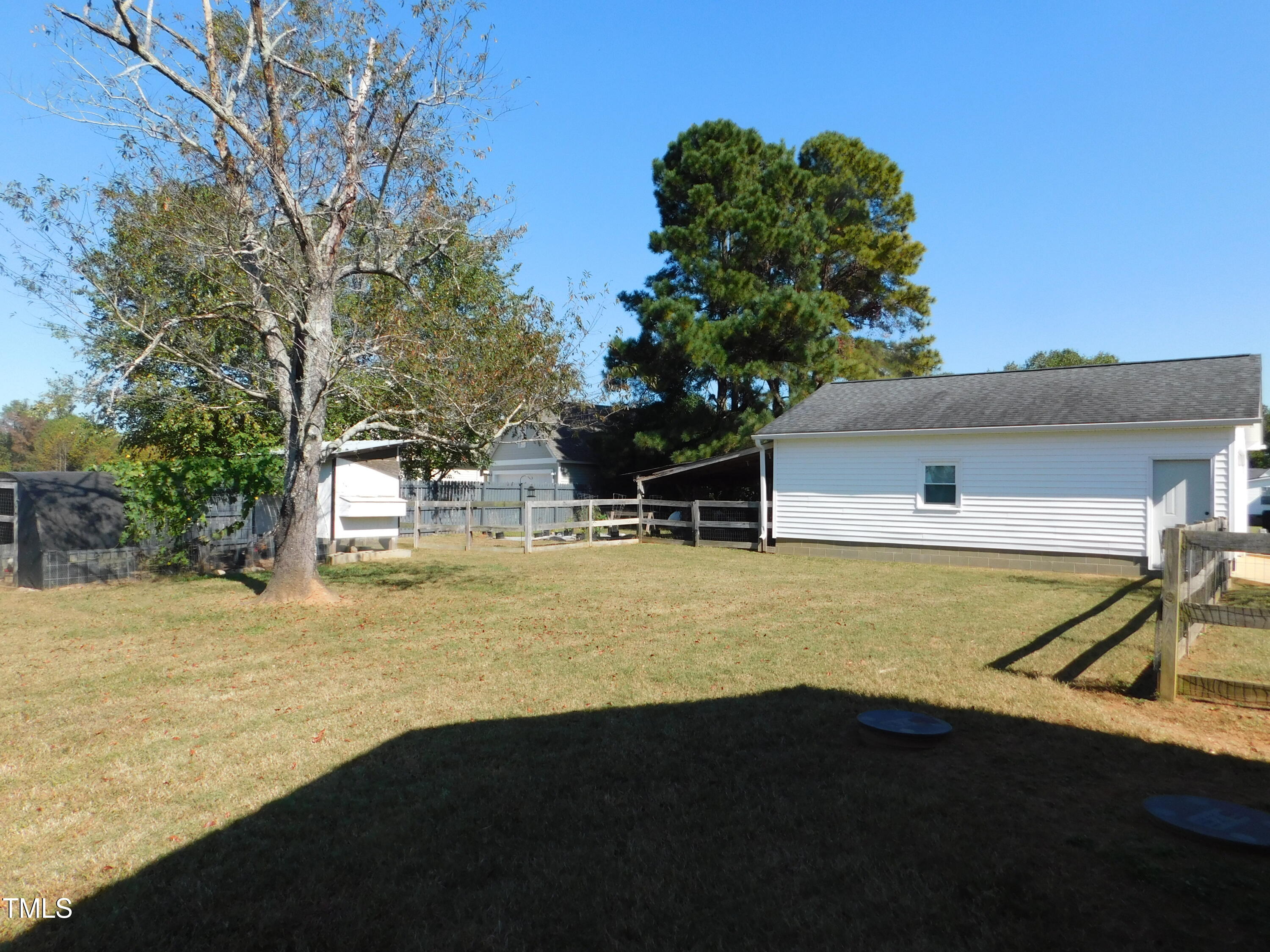 1168 Earpsboro Road Zebulon, NC 27597 - Photo 13 of 25 a view of a swimming pool with an outdoor space
