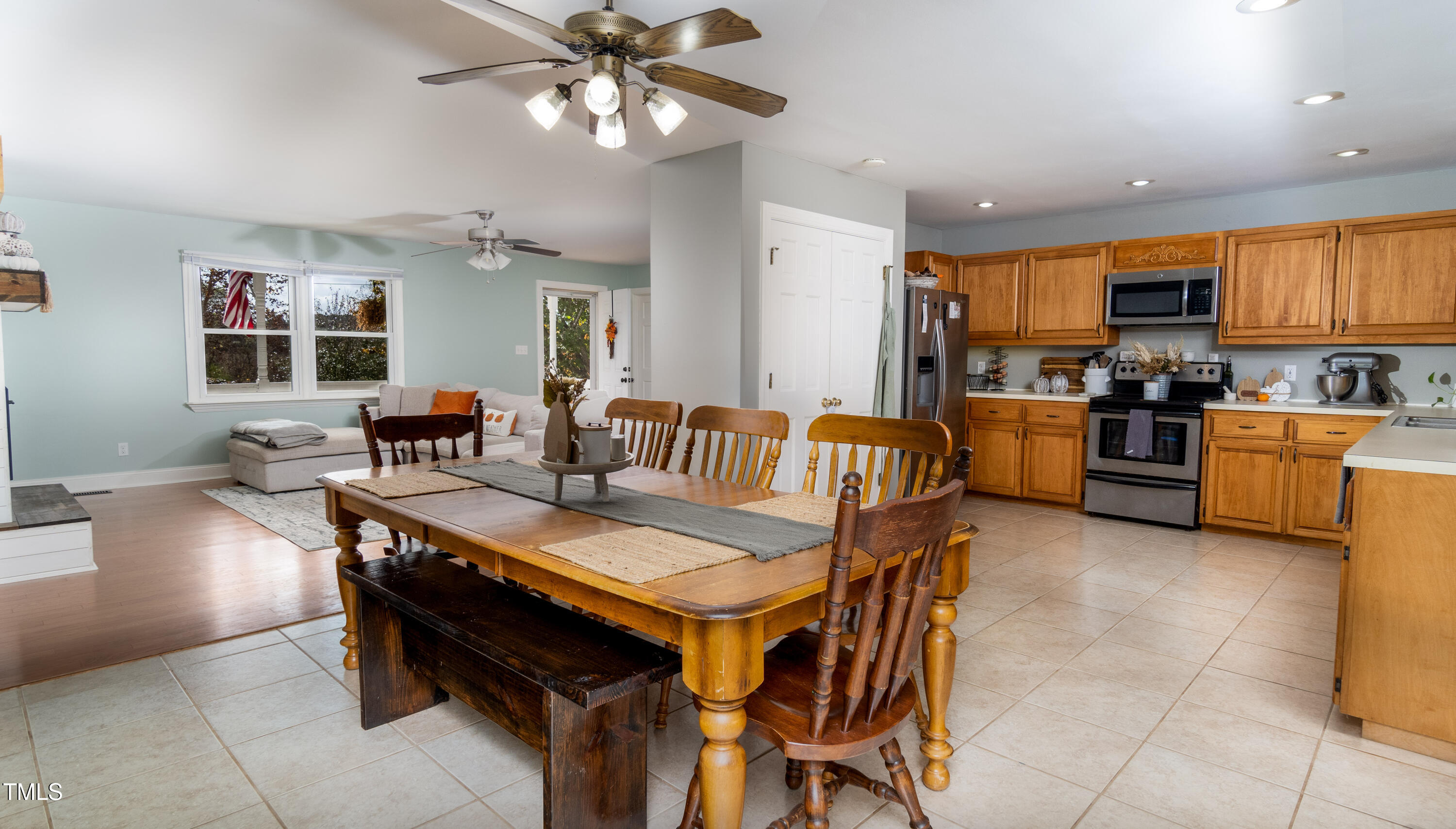 1168 Earpsboro Road Zebulon, NC 27597 - Photo 6 of 25 a view of a dining room with furniture and a chandelier
