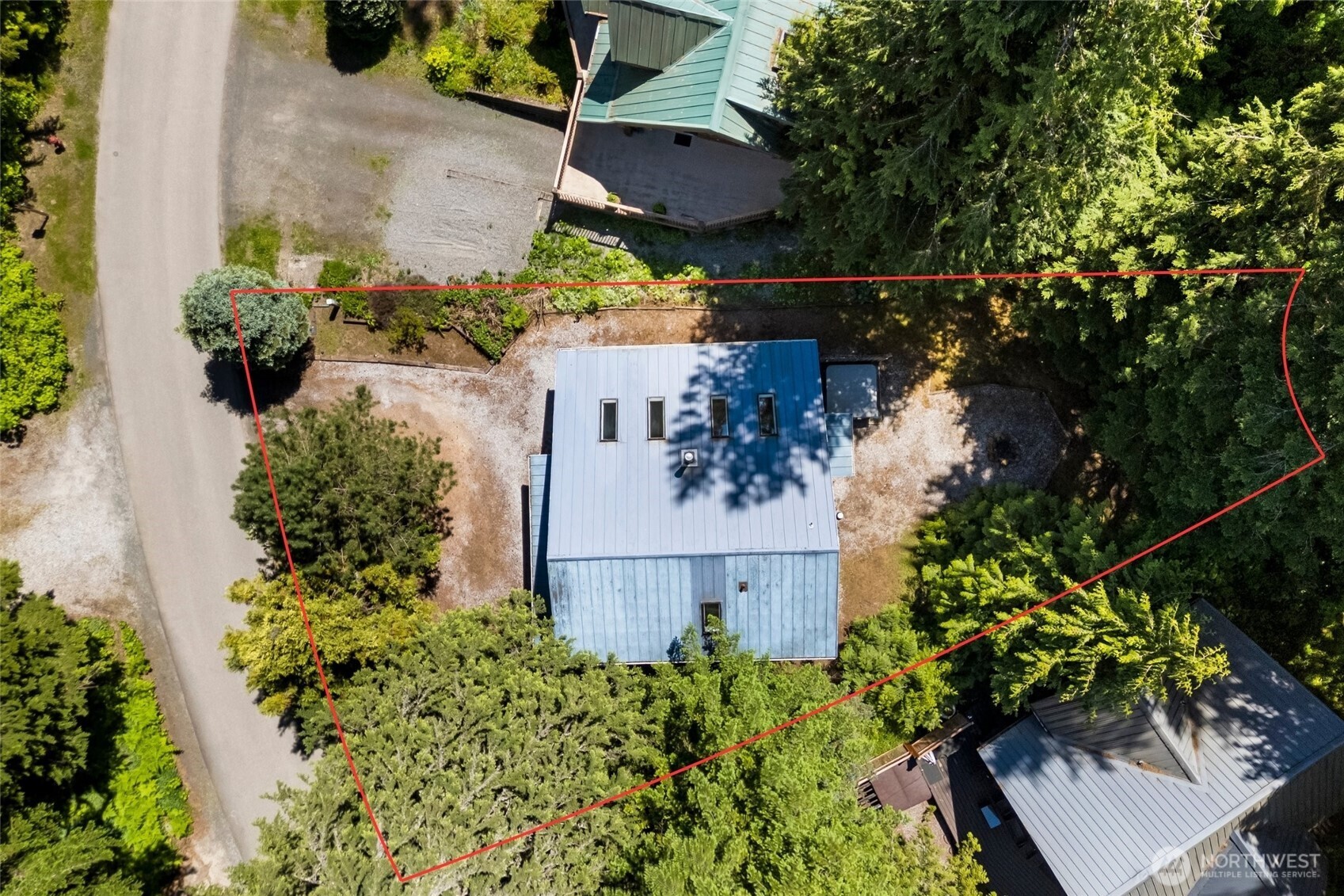 7101 Rainier Way Glacier, WA 98244 - Photo 31 of 40 an aerial view of a house with a yard and garden