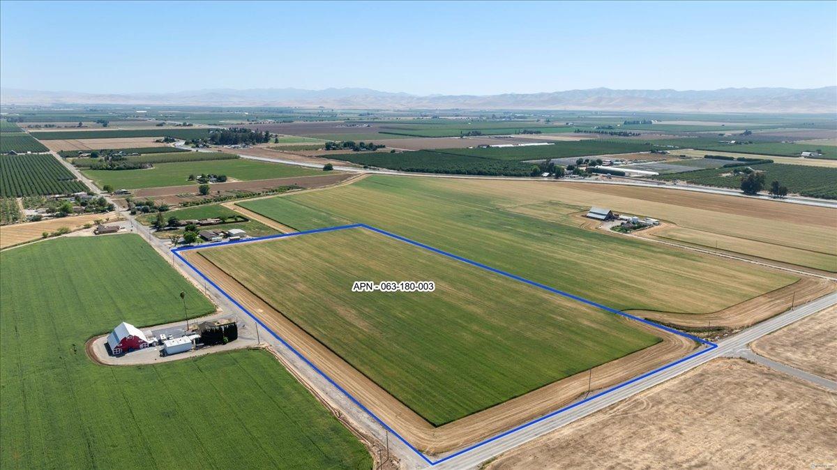 0 South Mills Road Gustine, CA 95322 - Photo 8 of 24 an aerial view of a pool and mountain