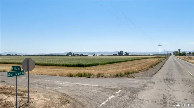 a view of a lake with a big yard