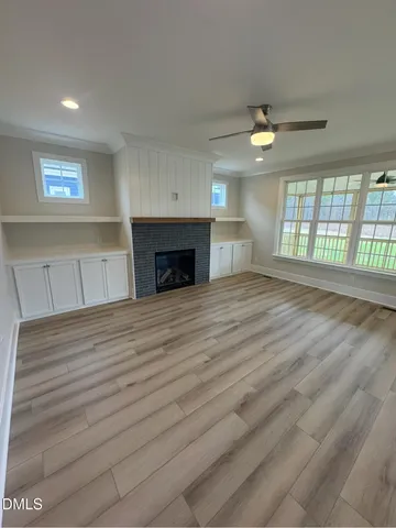 a bathroom with a sink and a window