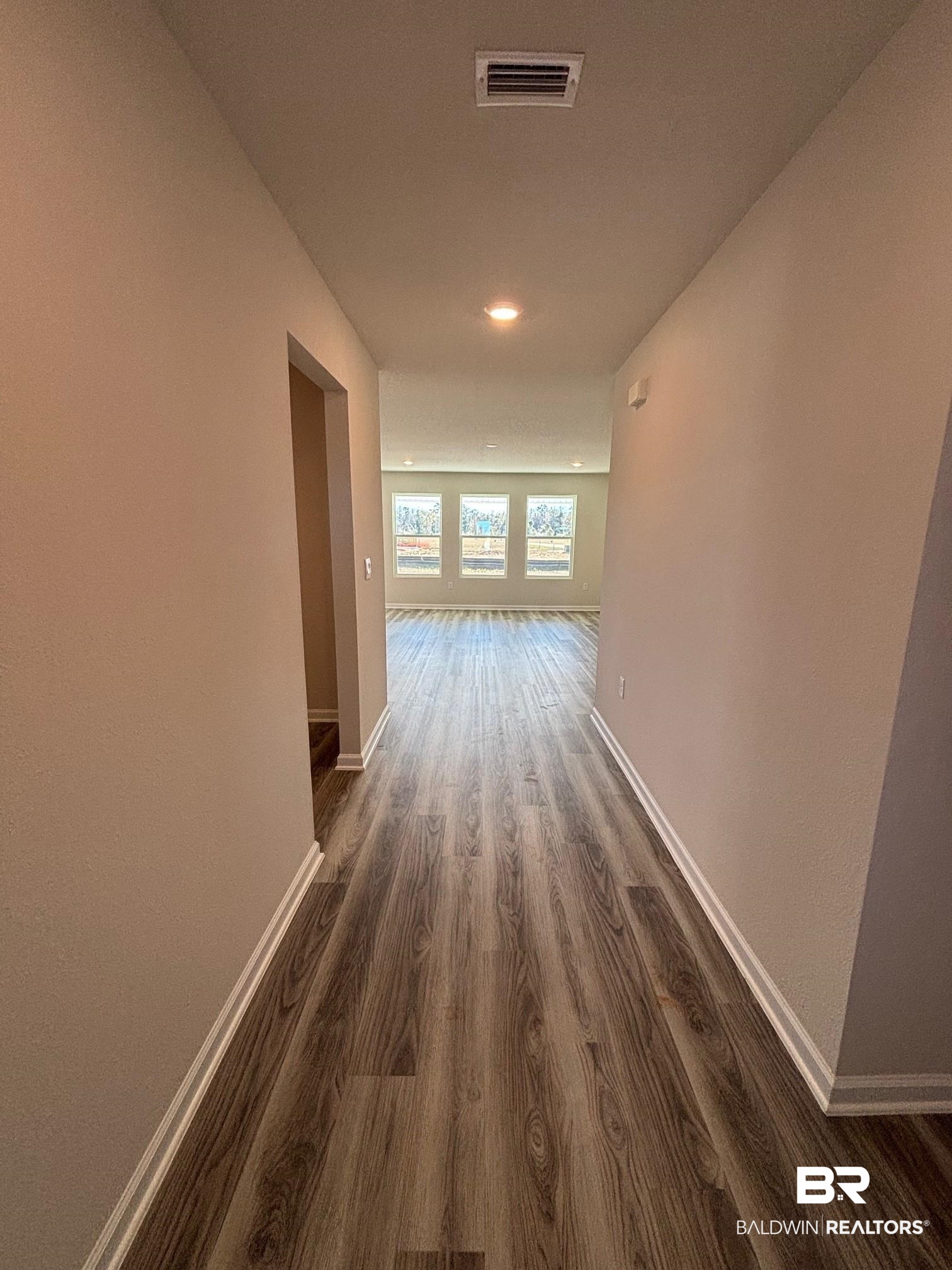 22044 Aleutian Avenue Foley, AL 36535 - Photo 2 of 28 Hall with dark hardwood / wood-style flooring