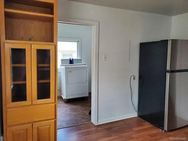 a view of a kitchen from the hallway
