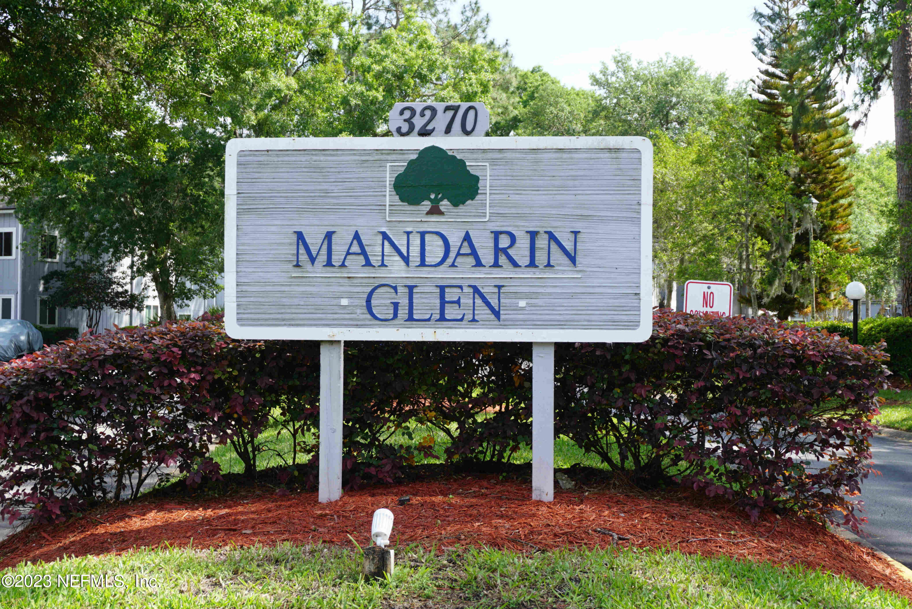 a view of outdoor space with sign board