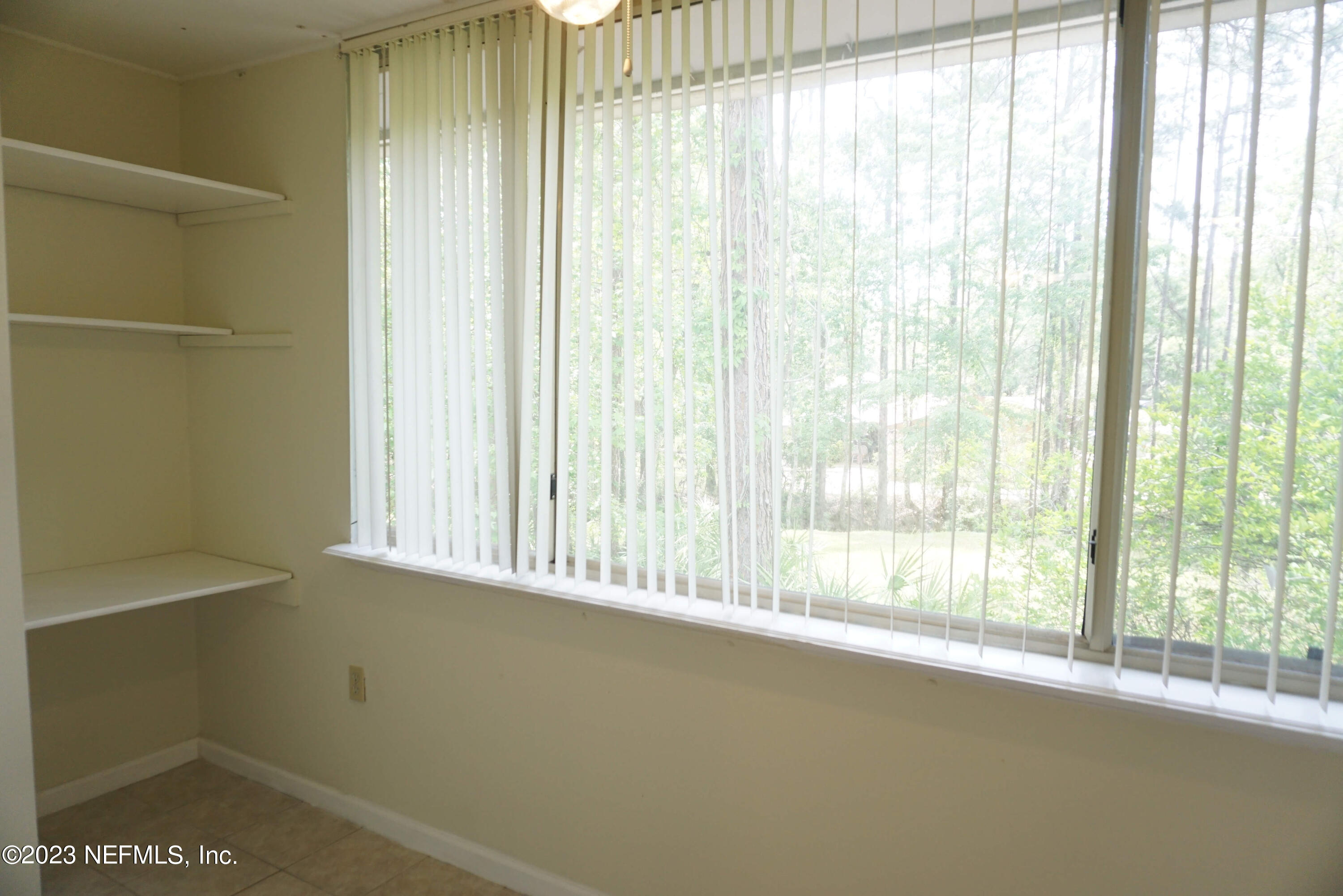 3270 Ricky Drive, Unit 803 Jacksonville, FL 32223 - Photo 8 of 16 a view of a room that has a window in it