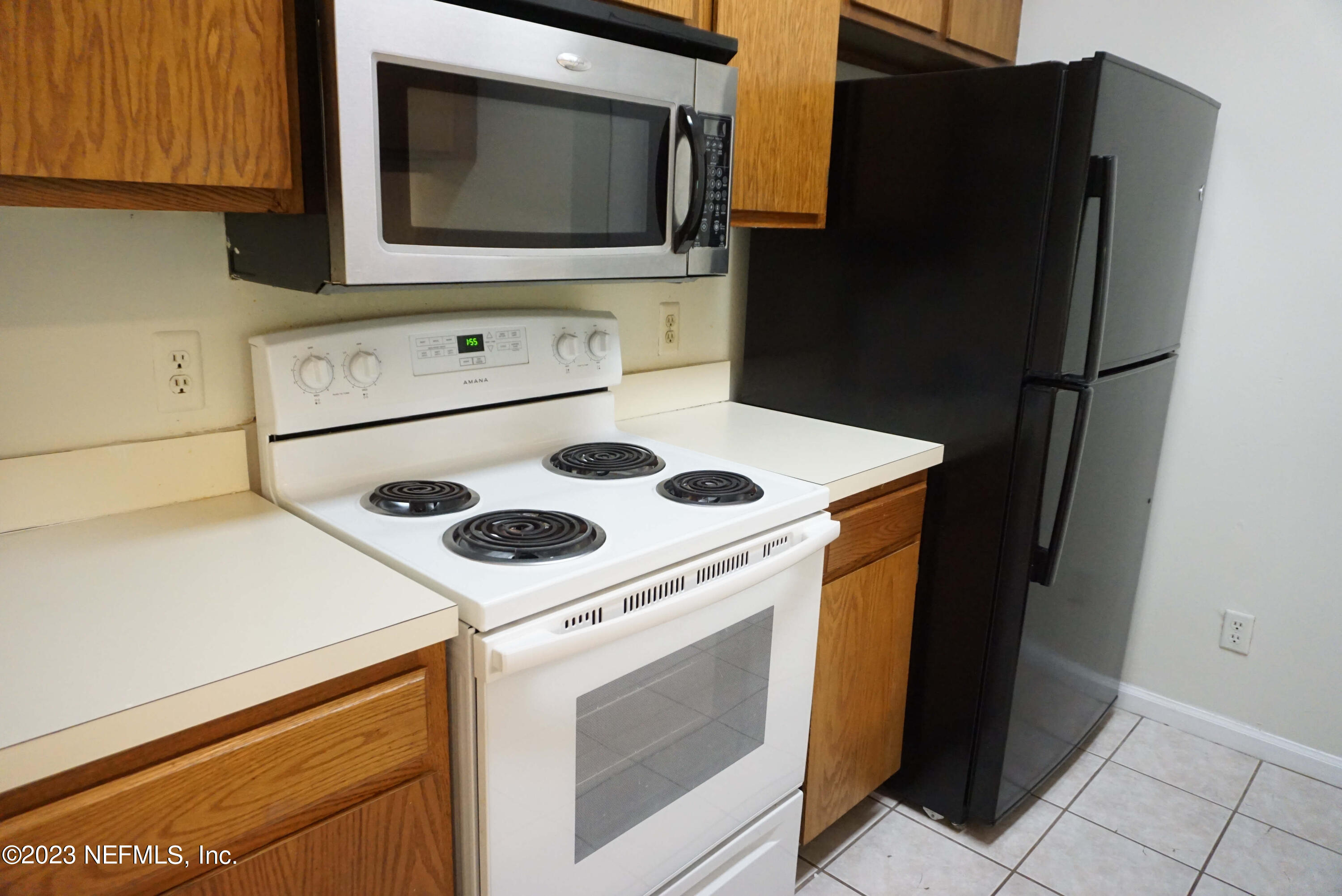 3270 Ricky Drive, Unit 803 Jacksonville, FL 32223 - Photo 9 of 16 a utility room with dryer and washer